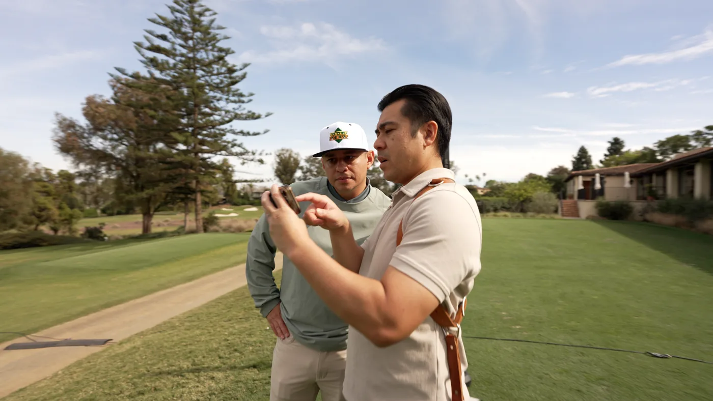 Brian Khou directing a shot on-course