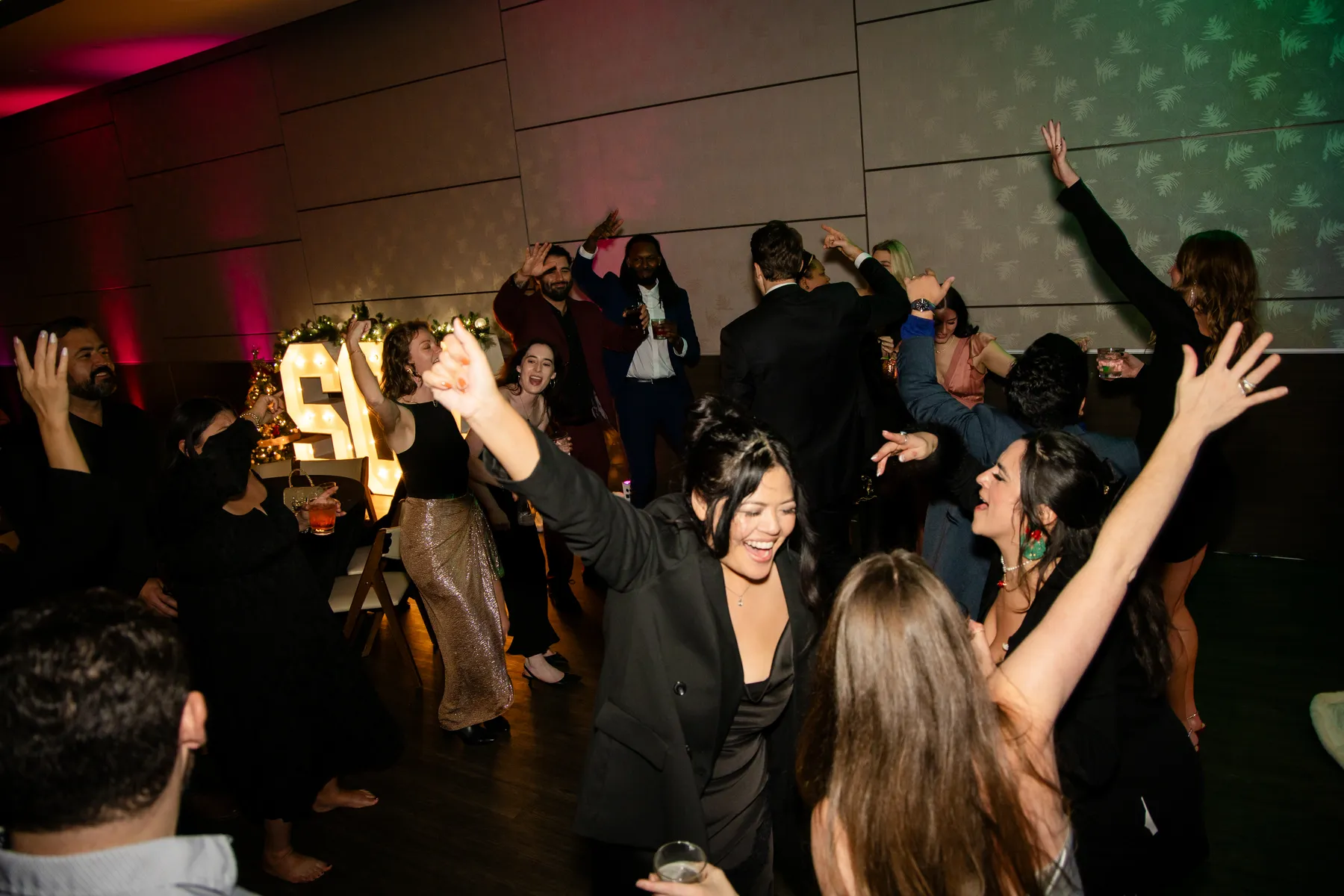 Peak dance-floor energy under the SQA marquee letters